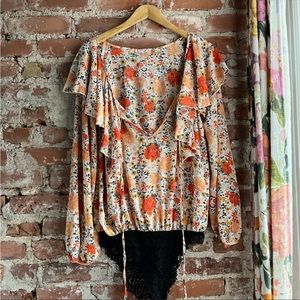 Free people body suit. In perfect condition.